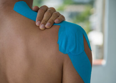 Shoulder Injury from a motor vehicle or car accident - blue tape